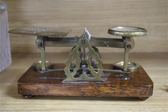 A set of postal scales and a set of apothecary scales